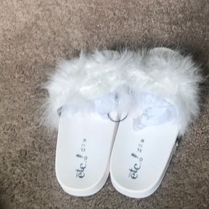 Slides brand new size 10